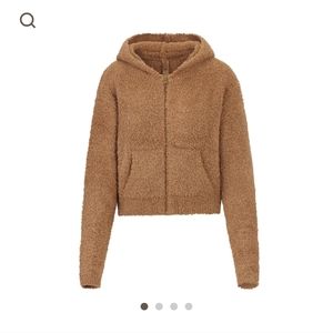 Skims NWT cozy knit zip up sweater.